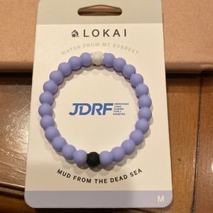 Beautiful brand new Lokai bracelet size medium gorgeous light purple color